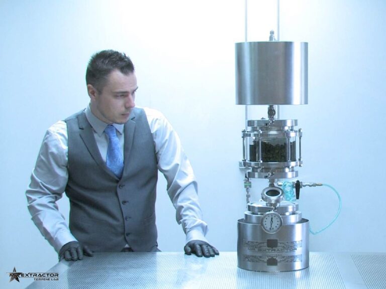 Andrew Jones, Mr. Extractor founder, in the lab with his original terpene extraction equipment